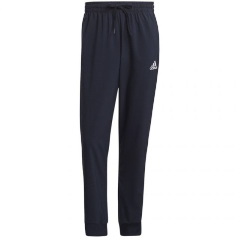 Spodnie adidas Essentials Tapered Cuff 3 Stripes Pants M GK8981 Spodnie adidas Essentials Tapered Cuff 3 Stripes Pants M GK8981