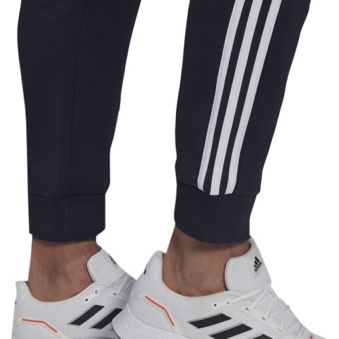 Spodnie adidas Essentials Colorblock Fleece M HK2884 Spodnie adidas Essentials Colorblock Fleece M HK2884