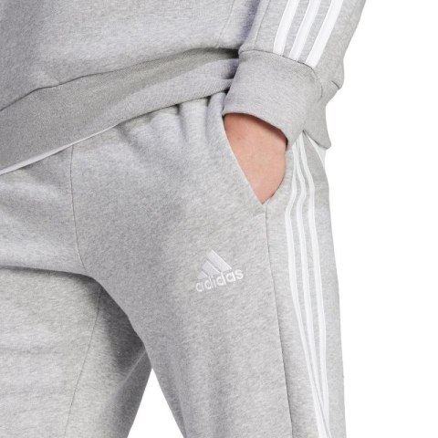 Spodnie adidas Essentials Fleece 3-Stripes Tapered Cuff M IJ6494 Spodnie adidas Essentials Fleece 3-Stripes Tapered Cuff M IJ6494